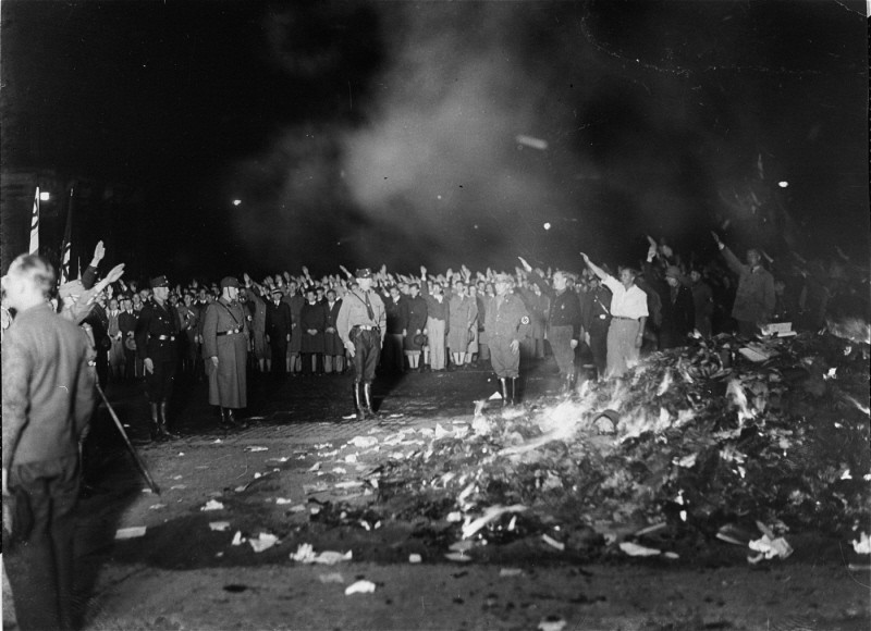 A crowd gathers to witness thousands of books, considered to be "un-German," burn in Opera Square in Berlin, Germany, during the Buecherverbrennung book burnings on May 10, 1933.
