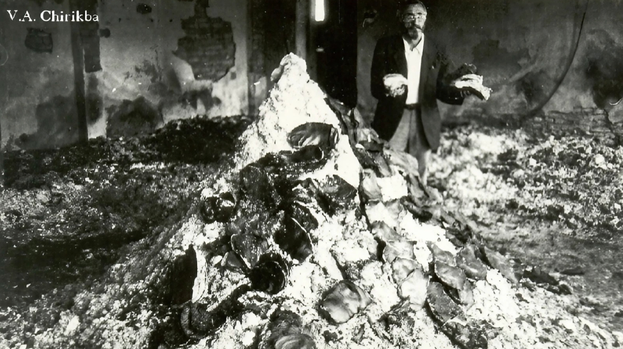 Ermolay Adzhindzhal in front of the archives turned to ashes. Photo by Viacheslav Chirikba