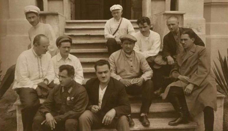 L. Beria, N.A. Lakoba, and V.D. Lakoba on steps of Smetsky family dacha. 